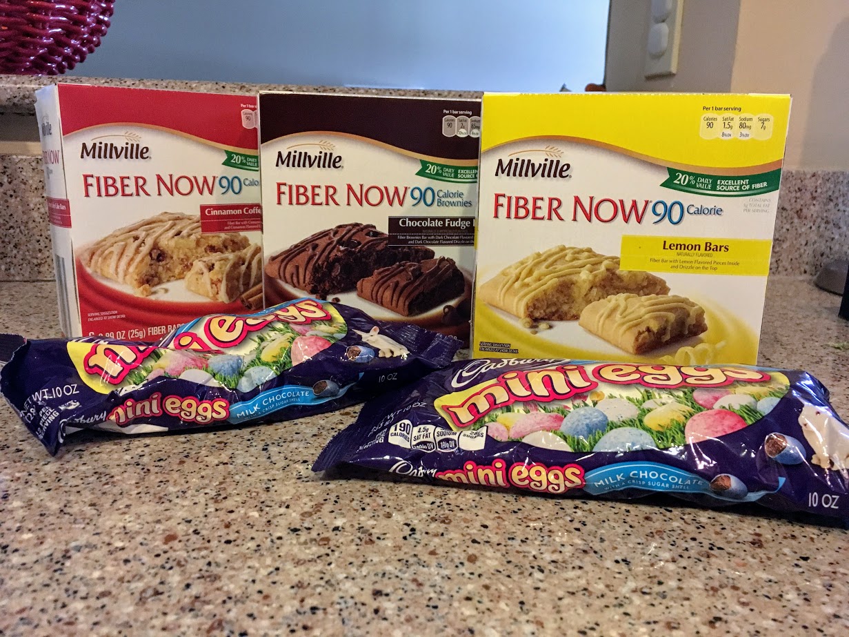 3 boxes of Fiber Now bars and 2 packages of mini Cadbury eggs