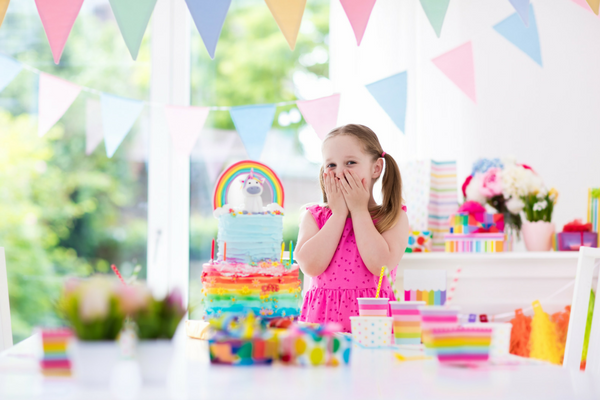 girly birthday party with toddler girl in pink dress